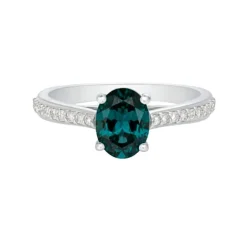 Anillo de oro blanco con diamantes 0,17 quilates y topacio London Blue