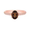 Anillo de oro rosa con diamantes 0.17 quilates y topacio marrón