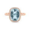 Anillo de oro rosa con diamantes y topacio azul 5.77 quilates