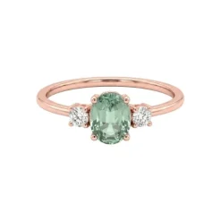 Anillo de oro rosa, diamantes 0.13 ct y zafiro 0.60 ct