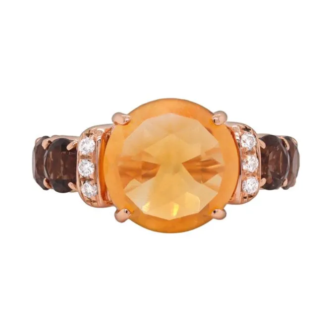 Anillo de oro rosa, diamantes 0.11 quilates y piedras de color