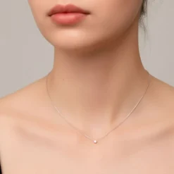 Colgante de oro blanco y diamante 0.30 quilates