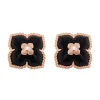 Pendientes flor con diamante 0.02 quilates y ónix 3.00 quilates