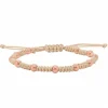 Pulsera de oro rosa y macramé beige