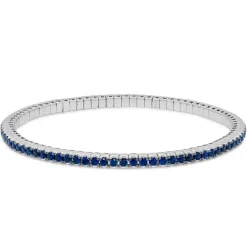 Pulsera riviere elástica de oro blanco y zafiros azules